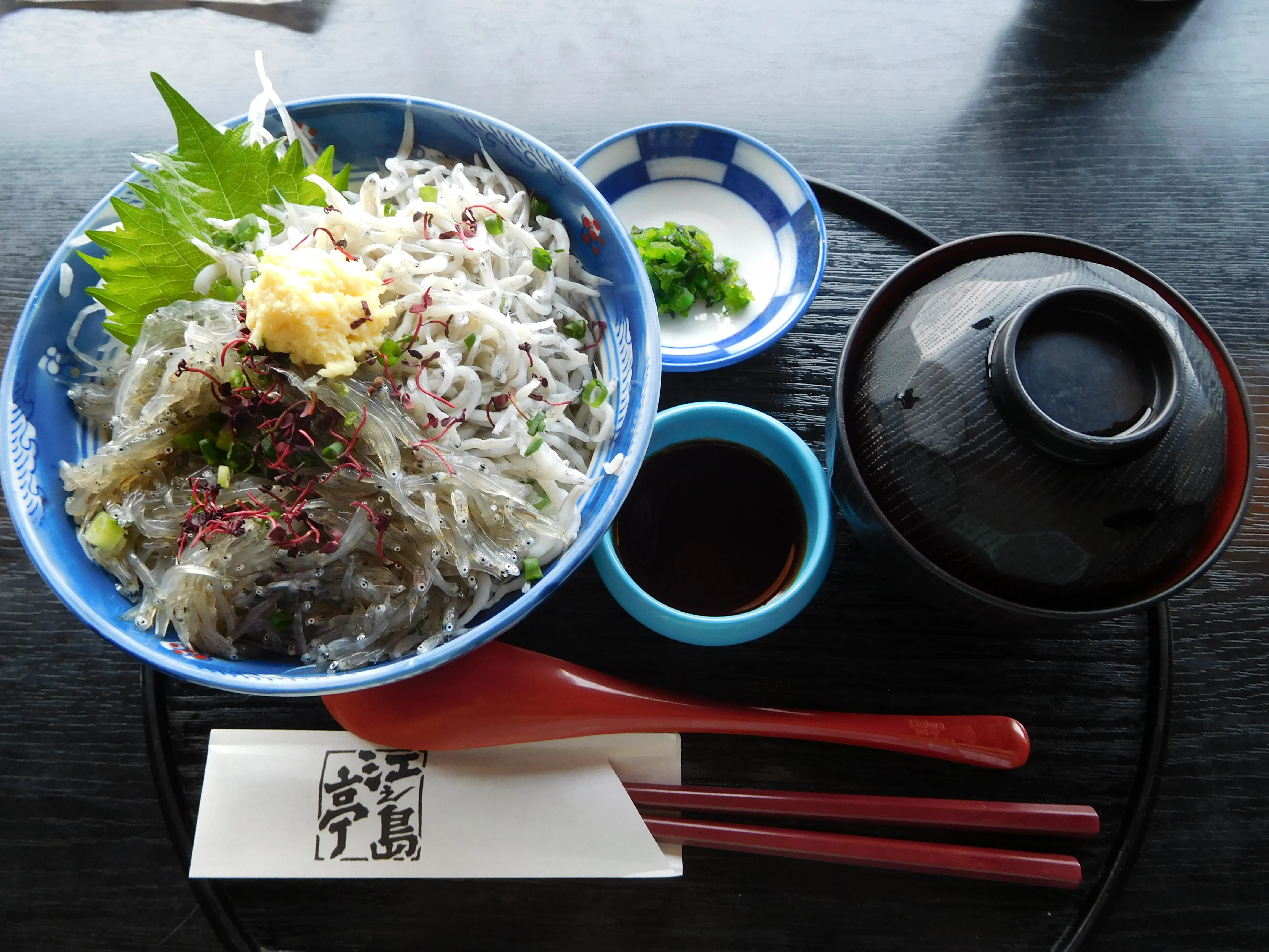 Lustrous Raw Shirasu Whitebait Crowned on Steaming Japanese Rice