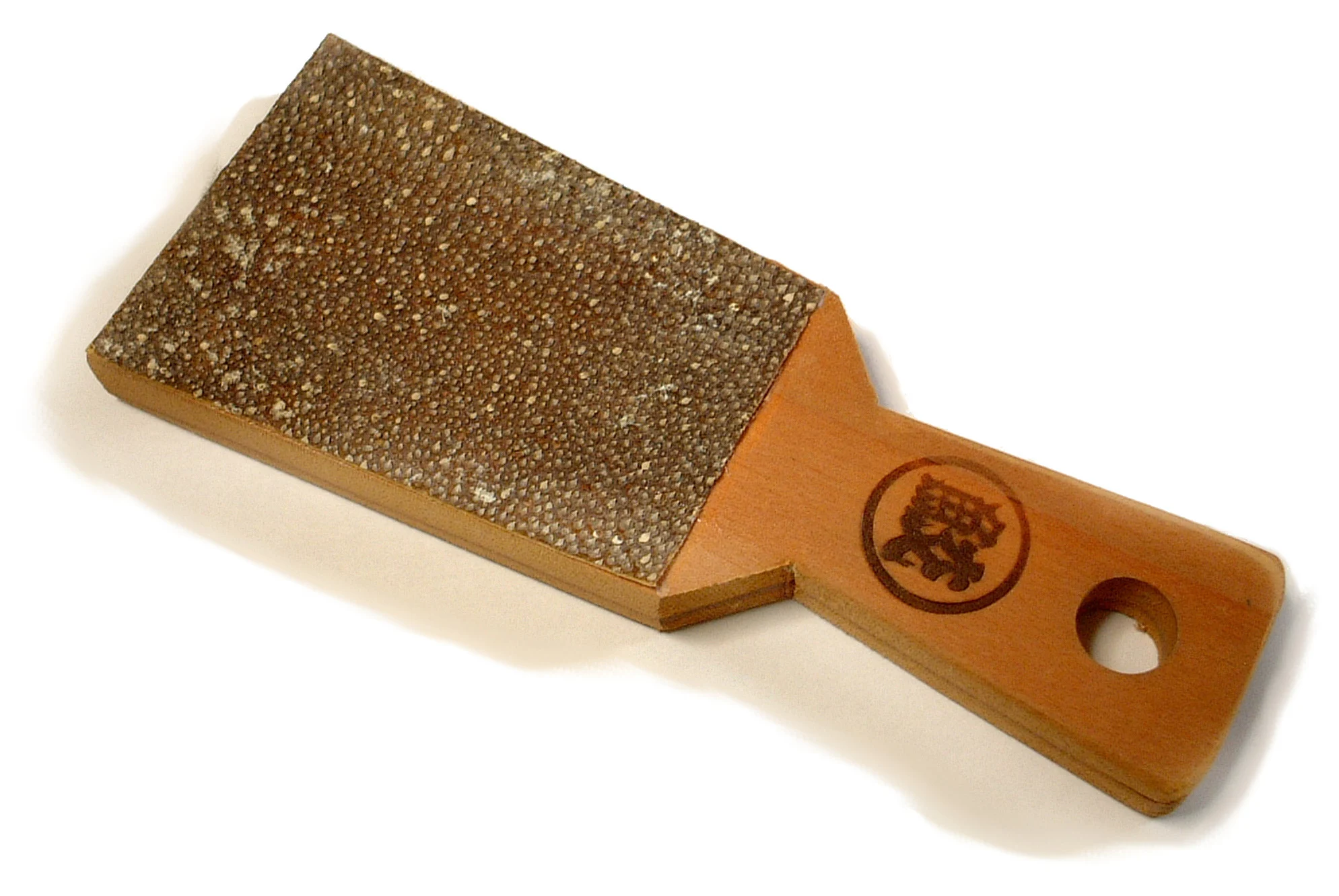 Fresh Hon-Wasabi Rhizome Grated in Circular Motions on Samekawa Sharkskin Grater