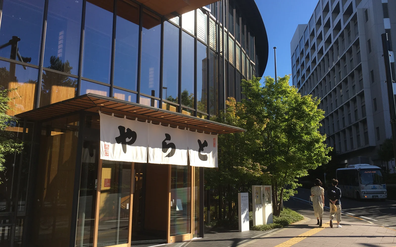 Modern architectural flagship of Toraya Akasaka featuring warm Hinoki timber and traditional washi aesthetics